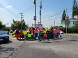 Una veintena de personas, que se identificó como vecinos de Alta Vista, se manifestó este martes en apoyo del uso del relleno sanitario